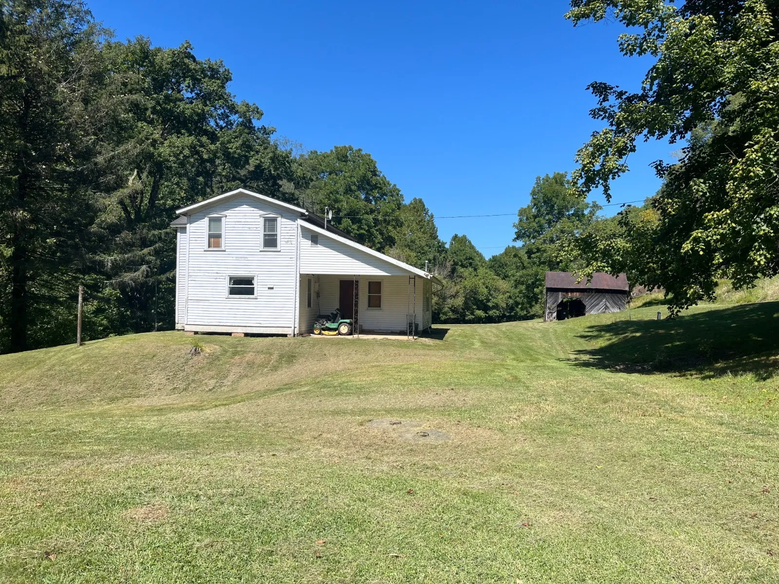 c.1901 Riverfront West Virginia Farmhouse For Sale on 5.25 Acres $59,900